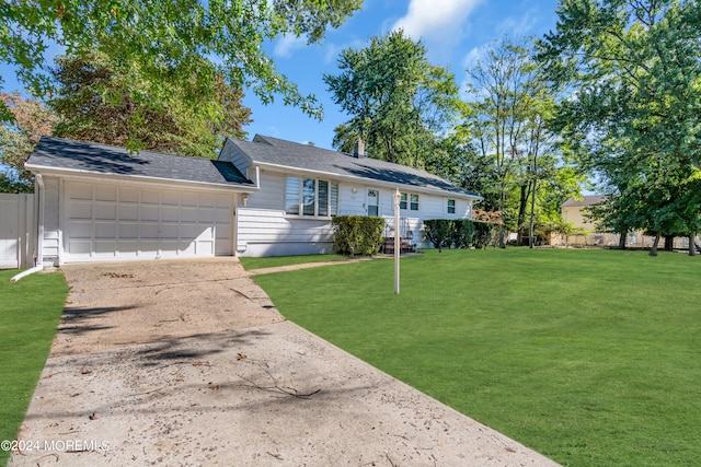 ranch-style house with a front yard and a garage