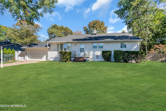 rear view of house with a yard