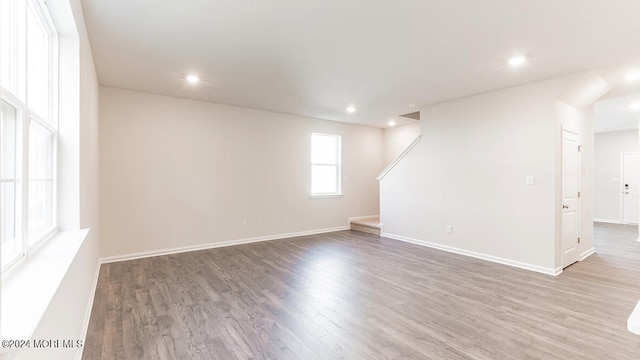 empty room with wood-type flooring