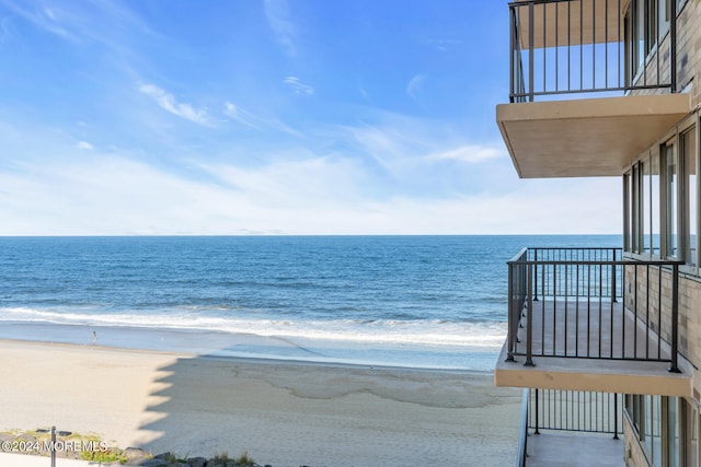 property view of water featuring a view of the beach