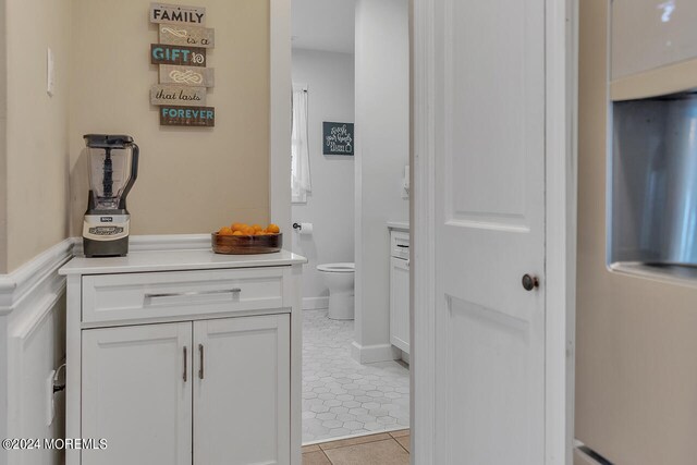 interior space featuring light tile patterned floors