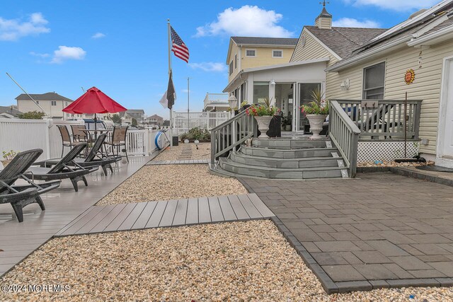 view of patio / terrace featuring a wooden deck