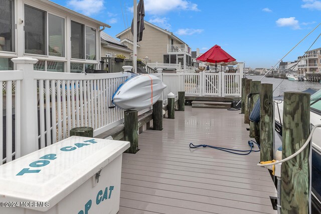 view of dock with a water view