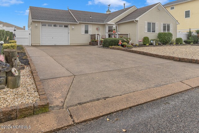 ranch-style home with a garage