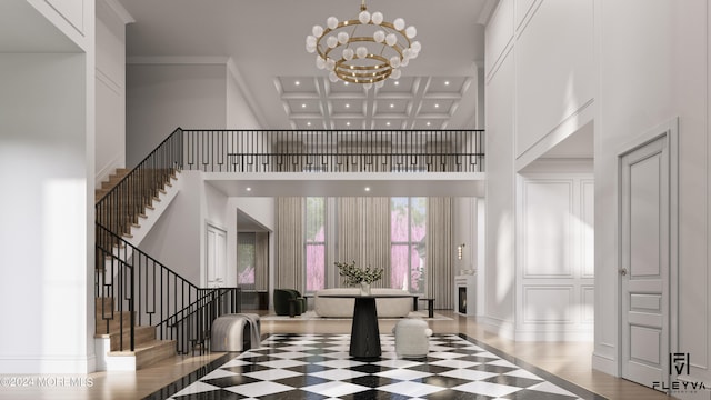 entrance foyer featuring ornamental molding, beam ceiling, light hardwood / wood-style flooring, coffered ceiling, and a towering ceiling