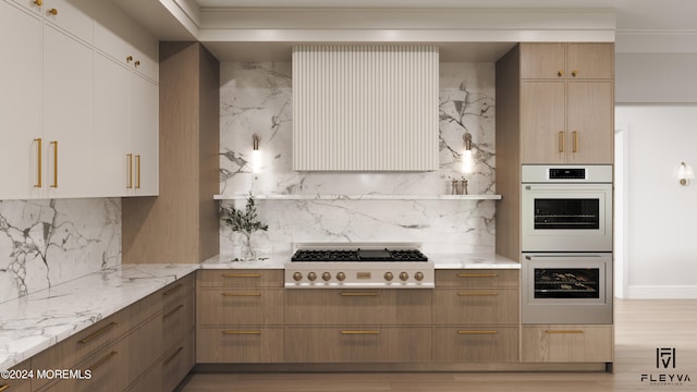 kitchen with light hardwood / wood-style flooring, light stone counters, stainless steel gas cooktop, and white double oven