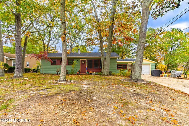 single story home with a garage