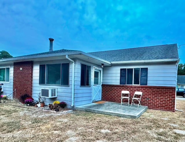 back of house with a patio area