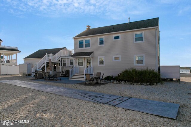 back of house featuring a patio