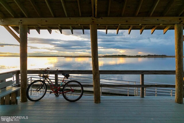 view of dock with a water view