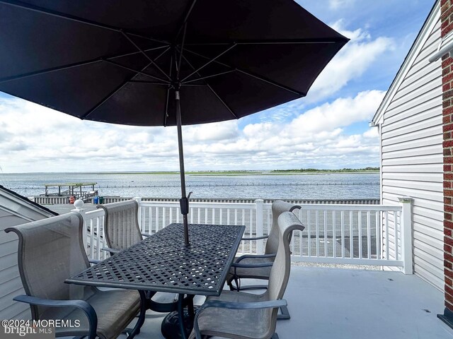 view of patio / terrace featuring a water view