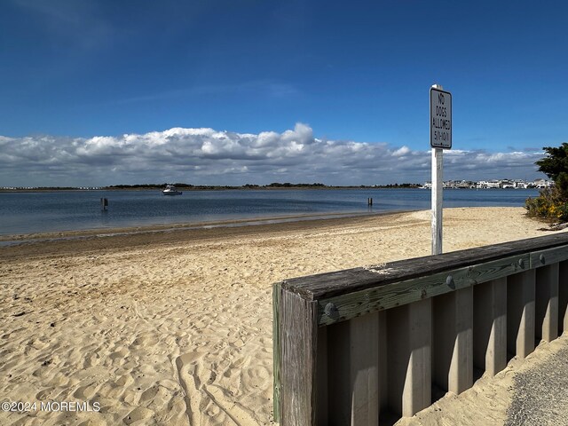 property view of water featuring a view of the beach