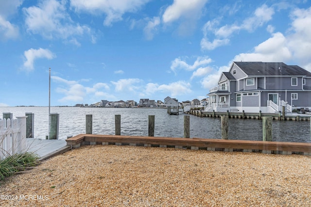 view of dock with a water view