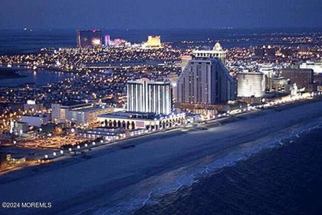 view of city with a view of the beach and a water view