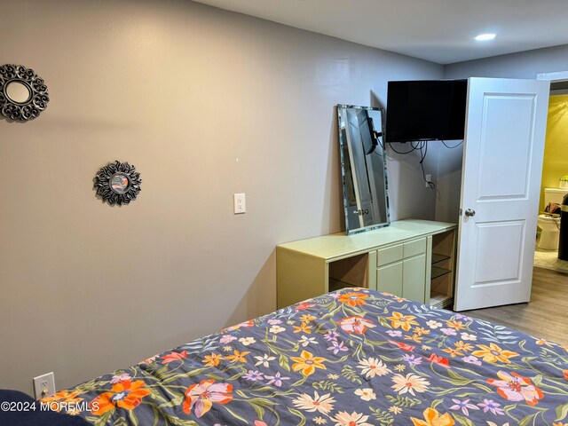 bedroom featuring light wood-type flooring