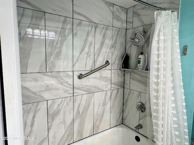 bathroom featuring shower / bath combination with curtain