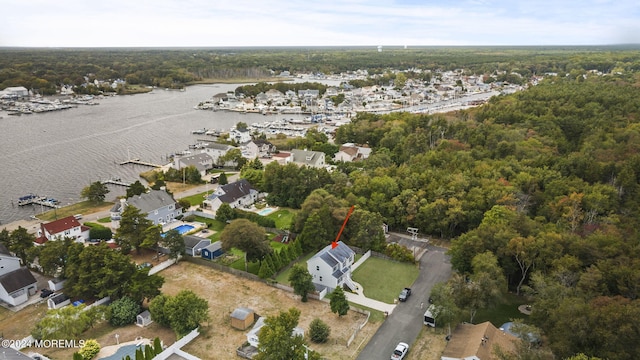 drone / aerial view with a water view