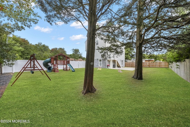 view of yard with a playground