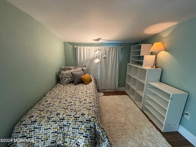 bedroom featuring hardwood / wood-style flooring