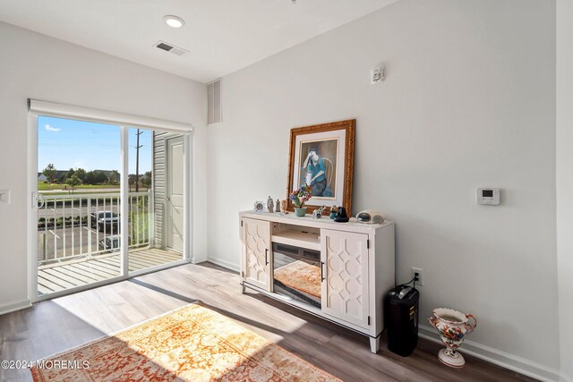 living area featuring light hardwood / wood-style floors