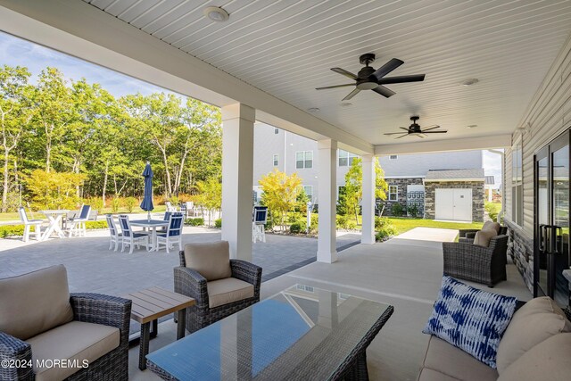 view of patio / terrace with ceiling fan and an outdoor hangout area