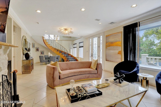 tiled living room with a high end fireplace and crown molding