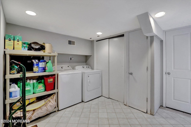 laundry area featuring washing machine and dryer