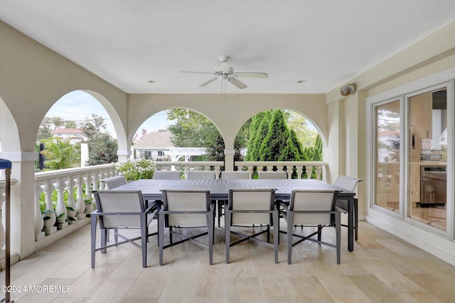 view of patio featuring ceiling fan