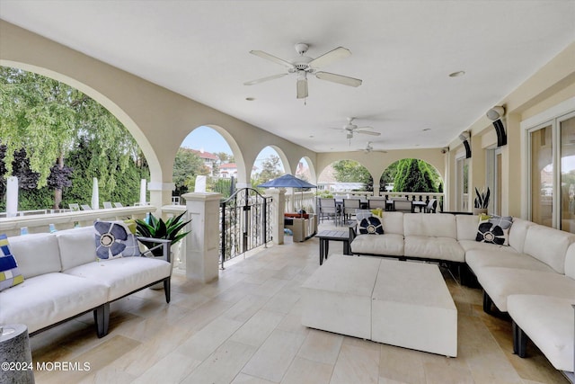 living room with ceiling fan