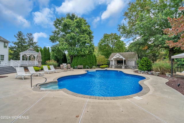 view of pool featuring a gazebo and a patio area