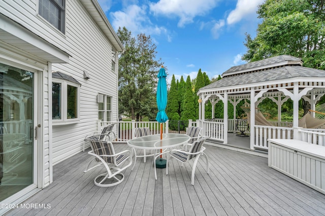 wooden deck featuring a gazebo