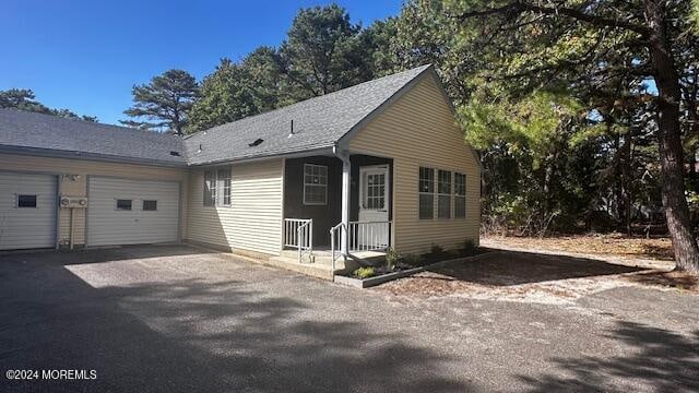 view of property exterior with a garage