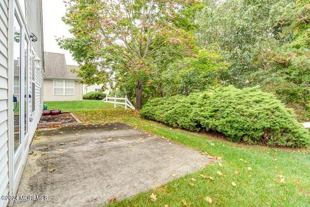 view of yard with a patio area