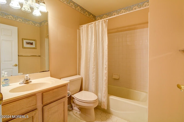 full bathroom with shower / bath combo, vanity, and toilet