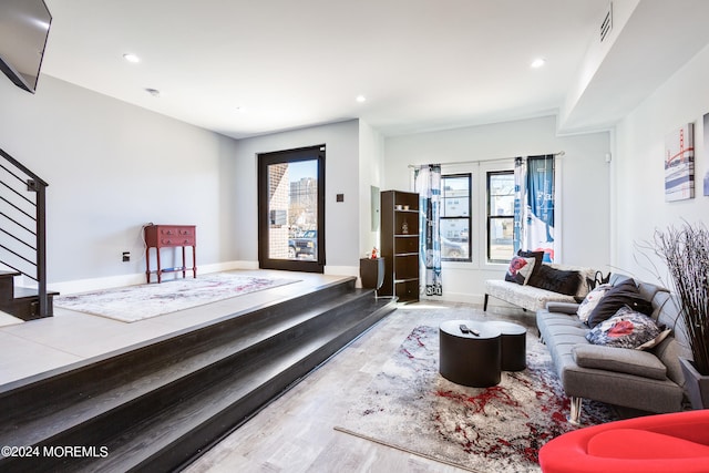 living room featuring hardwood / wood-style floors and french doors