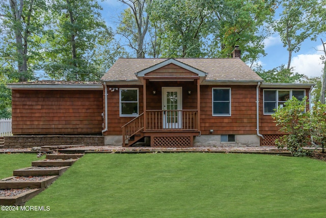 view of front of home featuring a front lawn