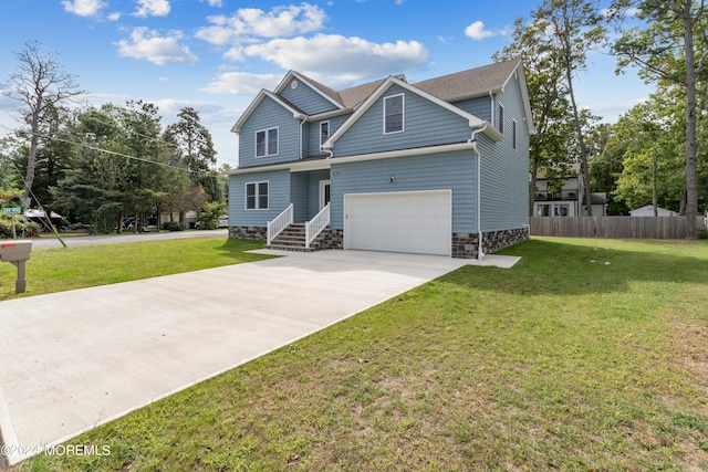 view of front facade featuring a garage and a front yard