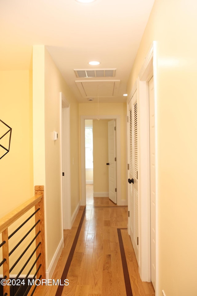 corridor featuring light wood-type flooring