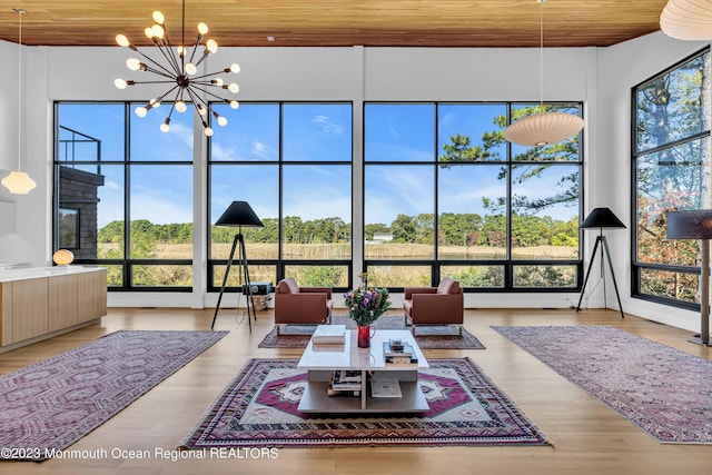 49 N Cherokee Ln, Brick, NJ 08724 - sunroom / solarium featuring plenty of natural light and a chandelier