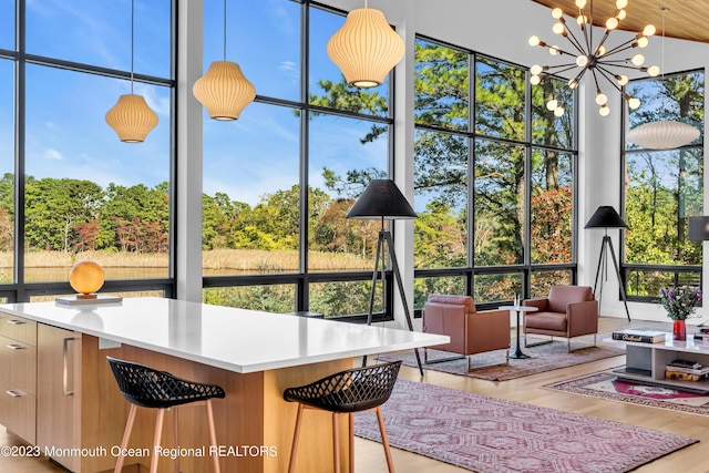 49 N Cherokee Ln, Brick, NJ 08724 - sunroom / solarium with a chandelier