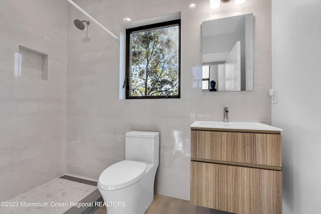 49 N Cherokee Ln, Brick, NJ 08724 - full bathroom with tiled shower, toilet, and vanity