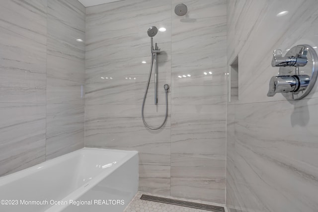 49 N Cherokee Ln, Brick, NJ 08724 - bathroom with a marble finish shower, a bathtub, and tile patterned flooring
