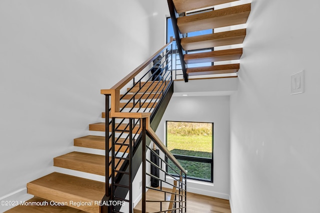 49 N Cherokee Ln, Brick, NJ 08724 - stairway with baseboards and wood finished floors