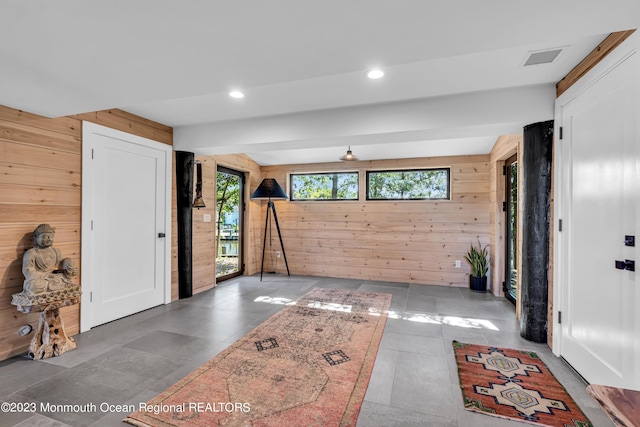 49 N Cherokee Ln, Brick, NJ 08724 - foyer with wood walls, recessed lighting, and tile patterned flooring
