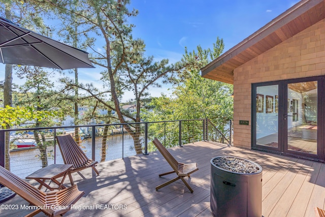 49 N Cherokee Ln, Brick, NJ 08724 - wooden deck featuring a water view