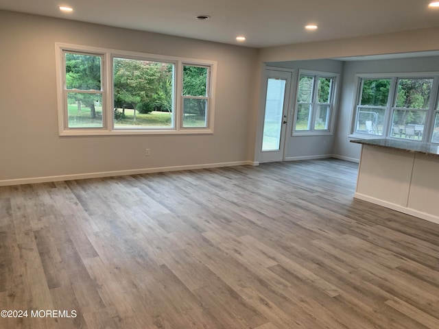 empty room featuring hardwood / wood-style flooring