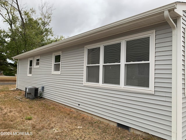 view of home's exterior featuring central AC unit