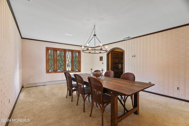 dining space with a chandelier, light carpet, baseboard heating, and crown molding