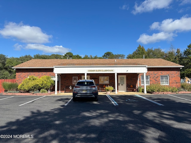 view of parking with a carport