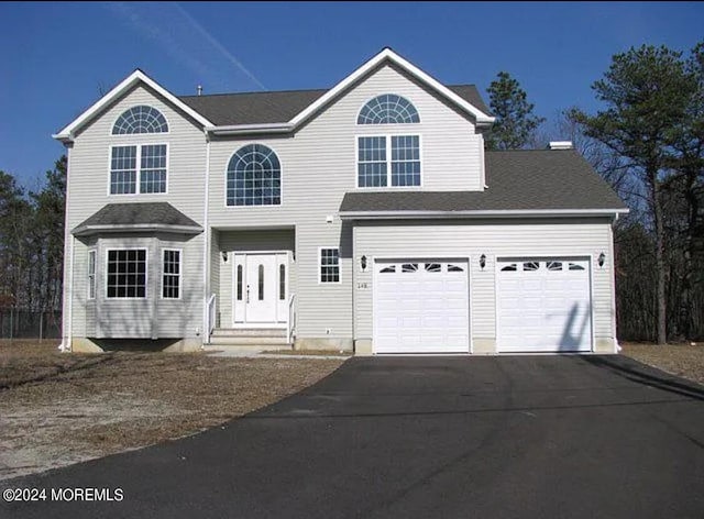 traditional-style home with driveway